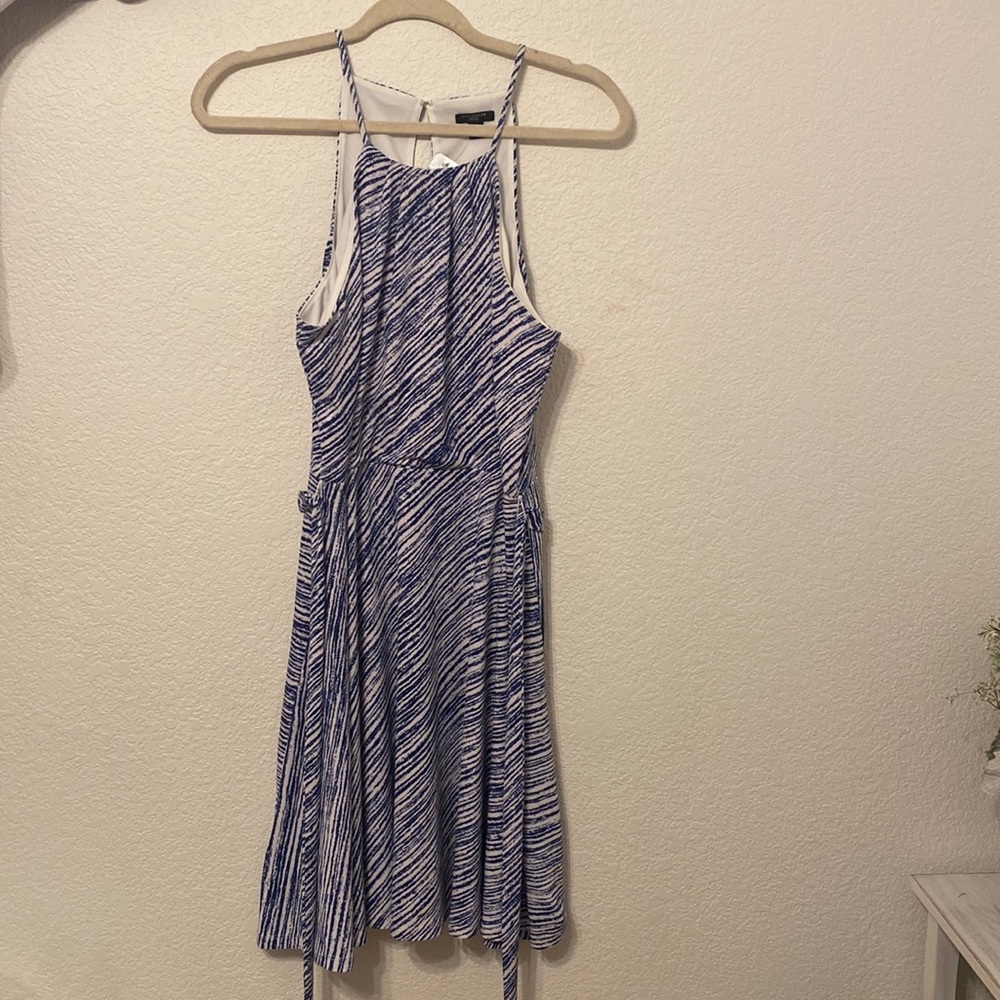 A long but mid length dress. Comes with a built on matching belt.
